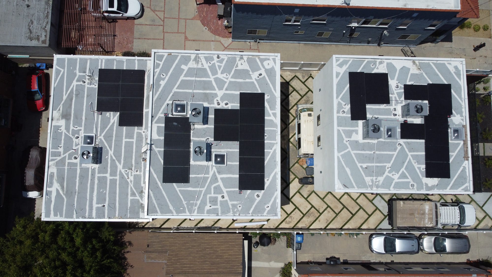 Completed rooftop solar installation with clean panel rows